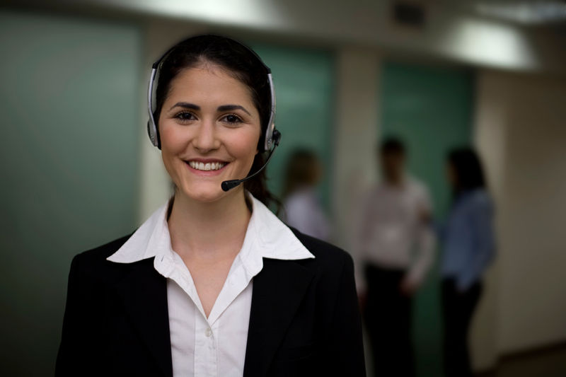 Smiling consultant wearing a headset