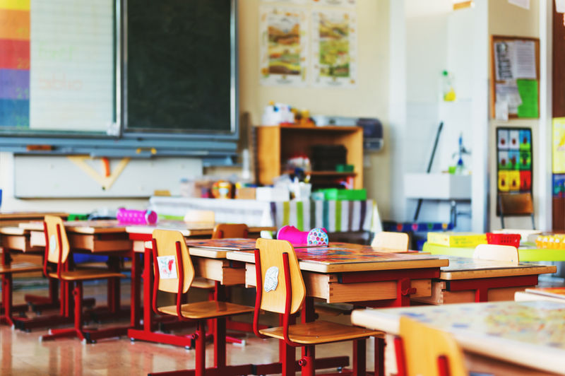 Classroom with small desks and chairs